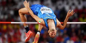 Athlete successfully completing a high jump
