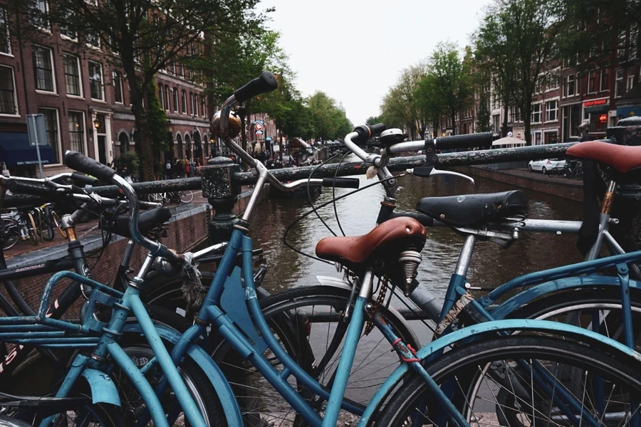 Bikes parked near from the Beautiful Amsterdam canals