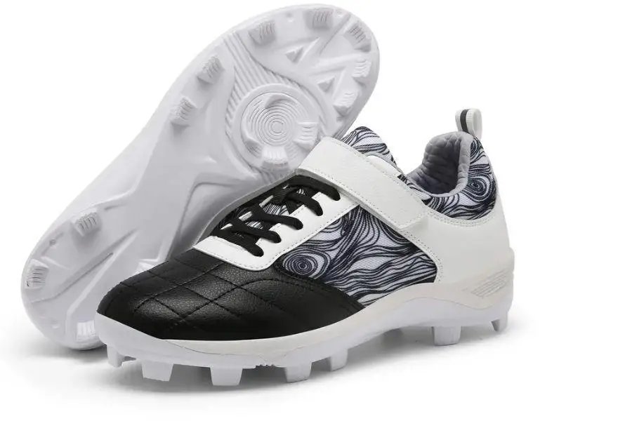 Black and white molded plastic baseball cleats