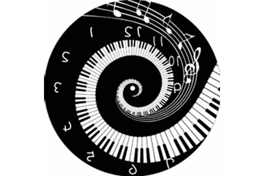 Black and white round clock with piano keyboard and notes