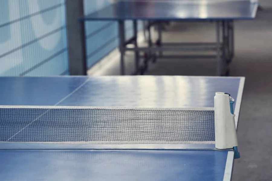 Blue table tennis table with net across center