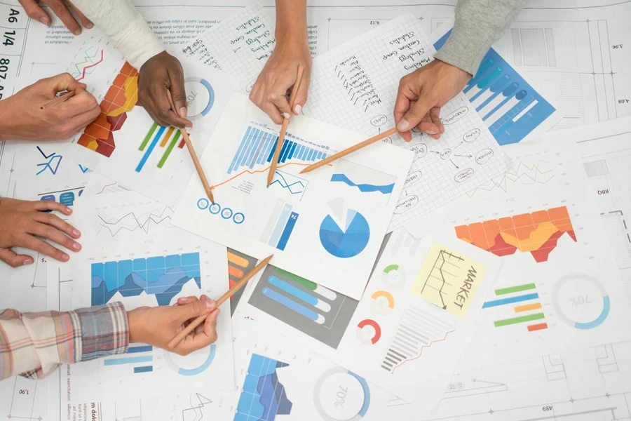 Business statistics documents laid out on a table