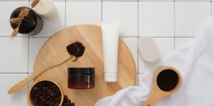 Coffee beans beside skincare products