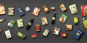 Collection of packaged food on grey background