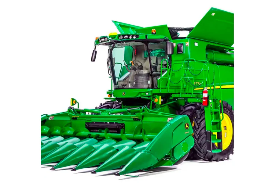Conventional lateral combine harvester with maize header