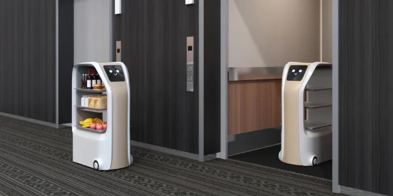 Delivery robot in elevator, another one carry food moving in the hall