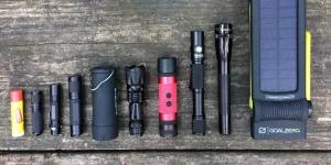 Different camping flashlight sizes on a table
