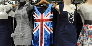 Dresses (one with a sequined British Flag) on display for sale in London
