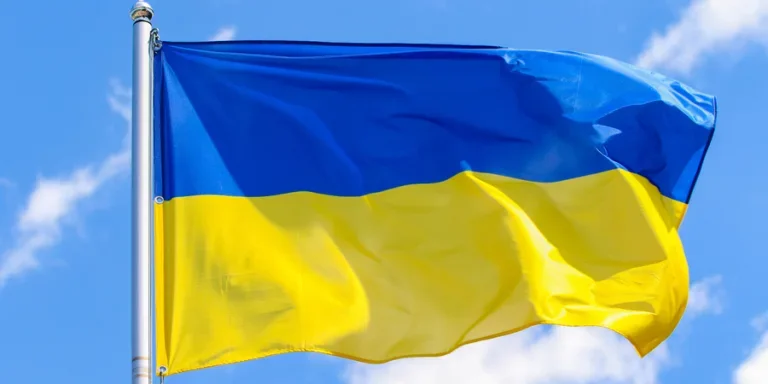 Flag of Ukraine on a background of blue sky