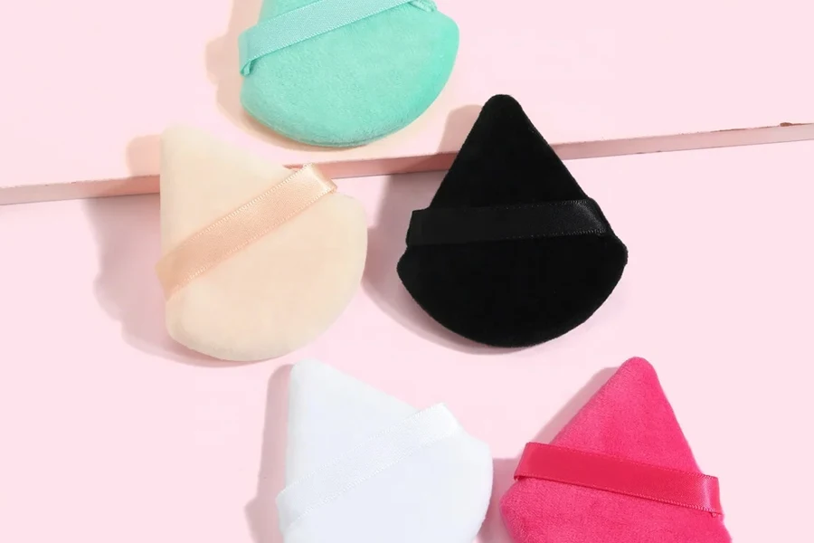 Flat top cosmetic puff with different colors