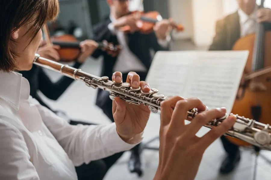 Flutist playing her instrument