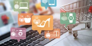 Laptop und Warenkorb mit Icon-Online-Shopping und Social-Media-Networking
