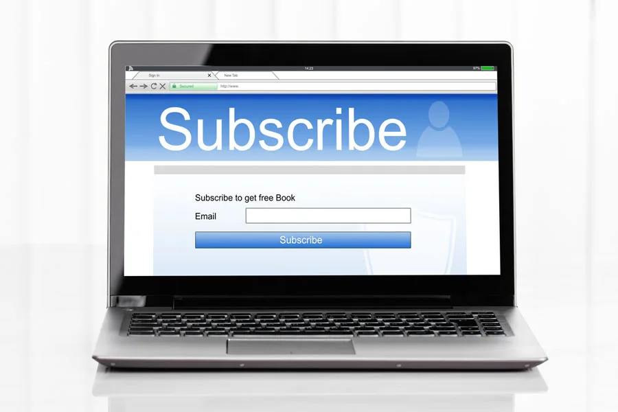 Laptop showing online subscription form