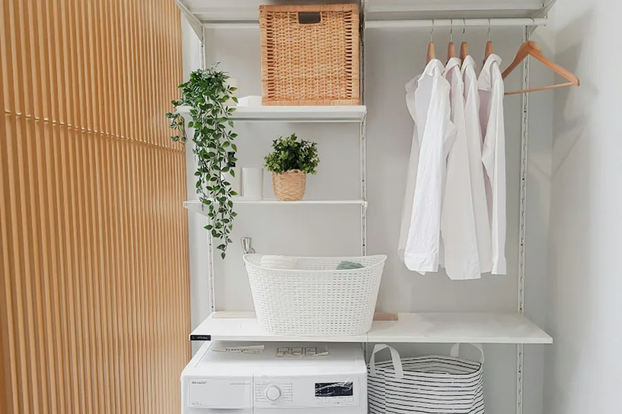 Laundry room wall shelves with drying rod
