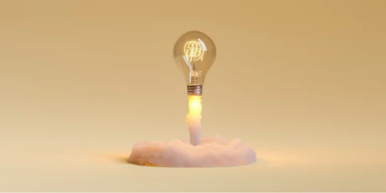Lightbulb rocket taking off representing a product launch