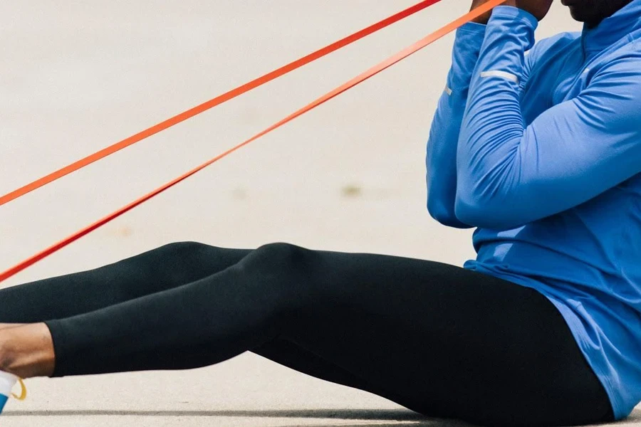 Man doing strength training with a resistance band