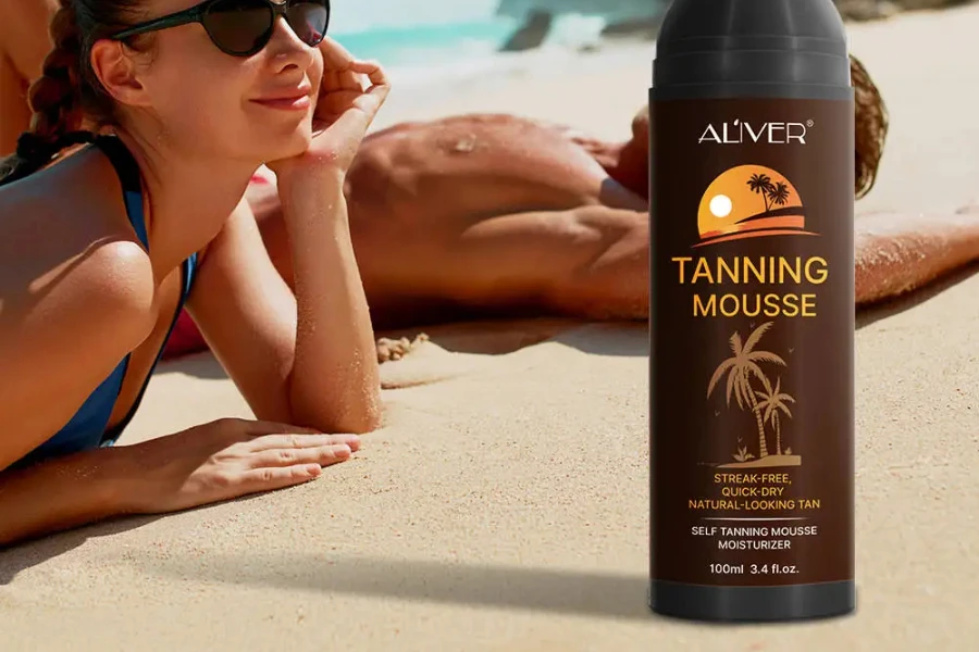 People on a beach next to a tanning lotion