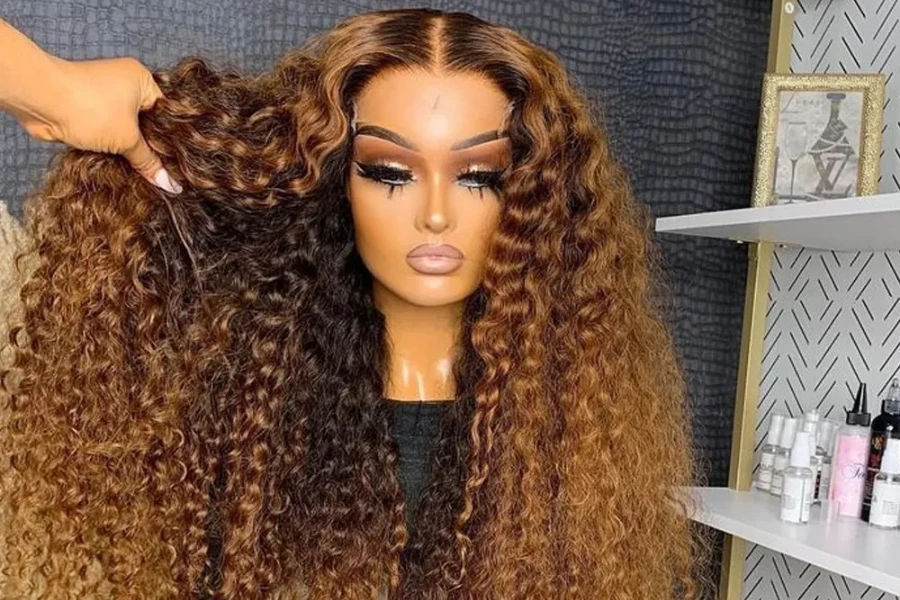 Person displaying a beautiful wig on a mannequin head