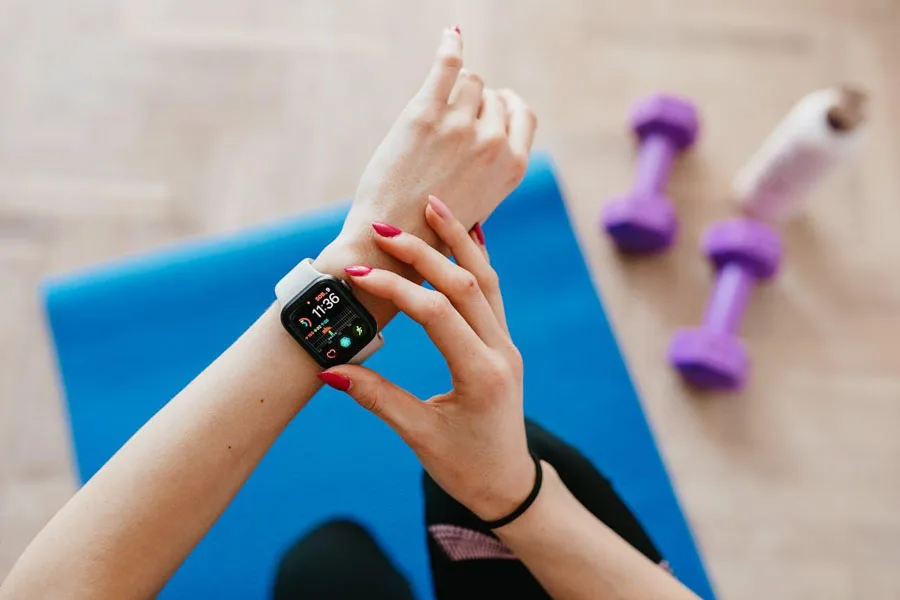 Person using a smartwatch while working out