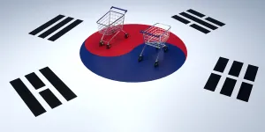 Shopping cart on the background of the flag of South Korea. 3d rendering