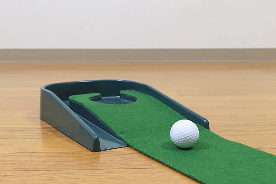 Small elevated putting green with white ball near the hole