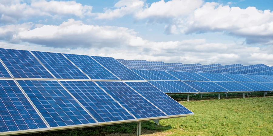 Solar Farm. Green Fields Blue Sky, Sustainable Renewable Energy