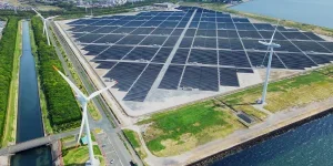 Solar power plant and Windmills aerial view