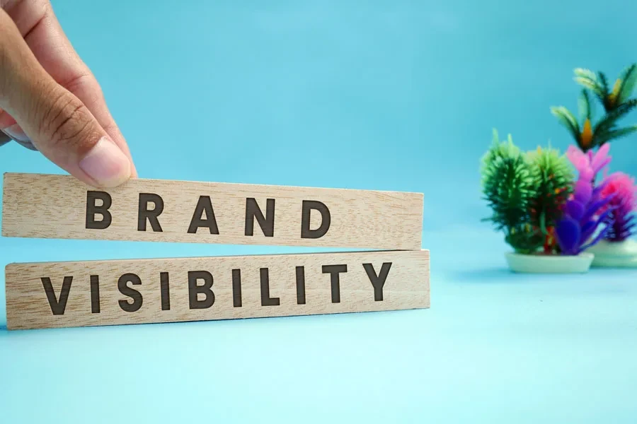 The term “BRAND VISIBILITY printed on wooden blocks