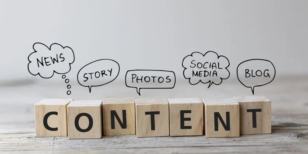 The word CONTENT” spelled on wooden cubes with speech bubbles