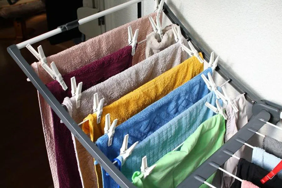 Towels hanging from extendable clothes horse