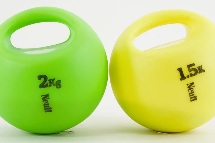 Two d-balls for discus training on a white background