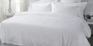 White cotton luxury bed set on bed