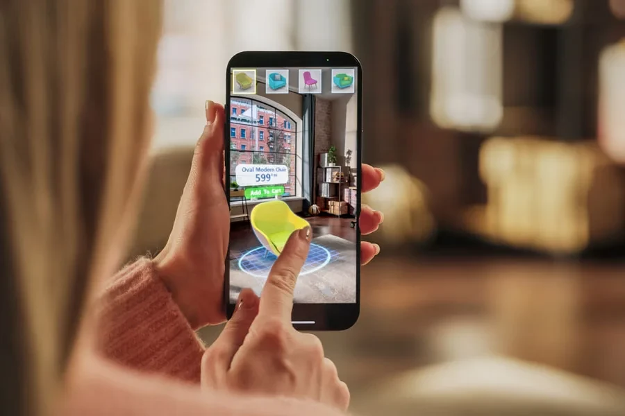 Woman using VR technology to decorate apartment