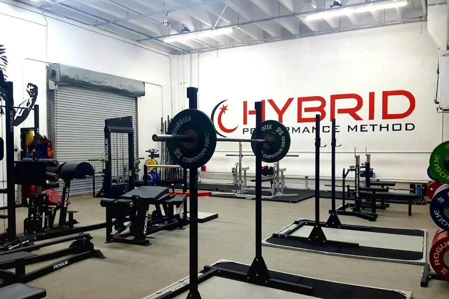 A barbell and weight plates in use