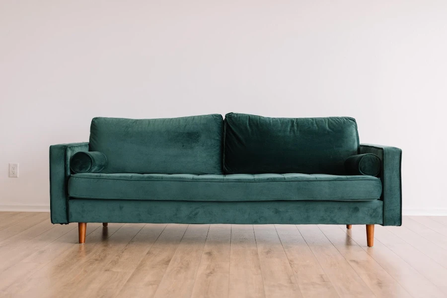 A beautiful velvet-tufted sofa