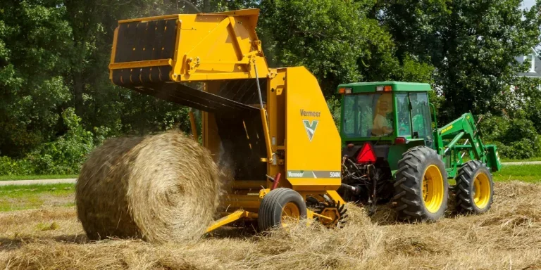 a hay baler on a farm