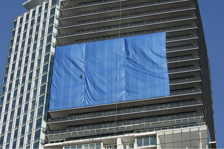 apartment tower with tarp
