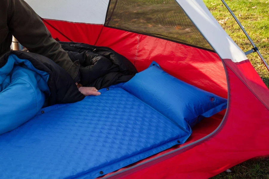 blue camping inflating mattress