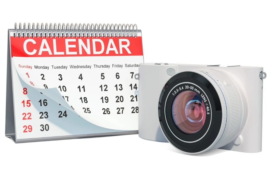 Calendar and camera in a white background
