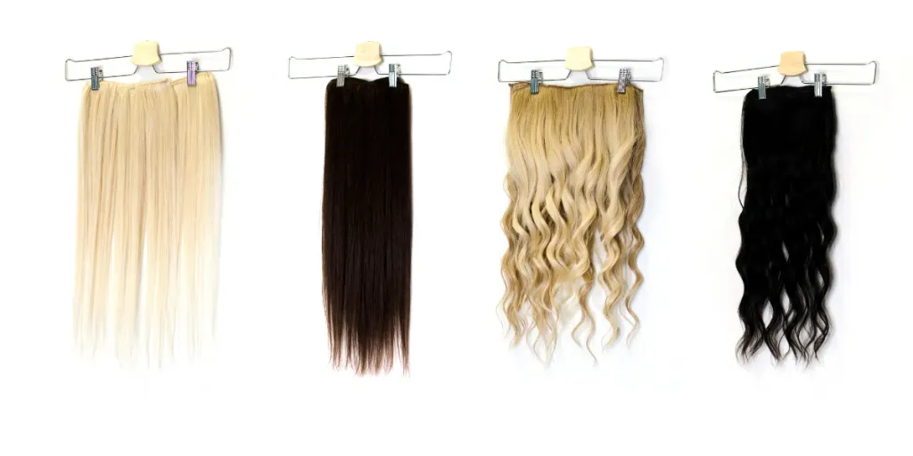 Colored hair extensions on clips in salon