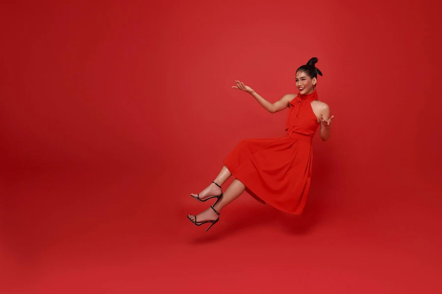 girl in red dress on red background