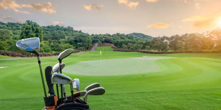 golf clubs and green course