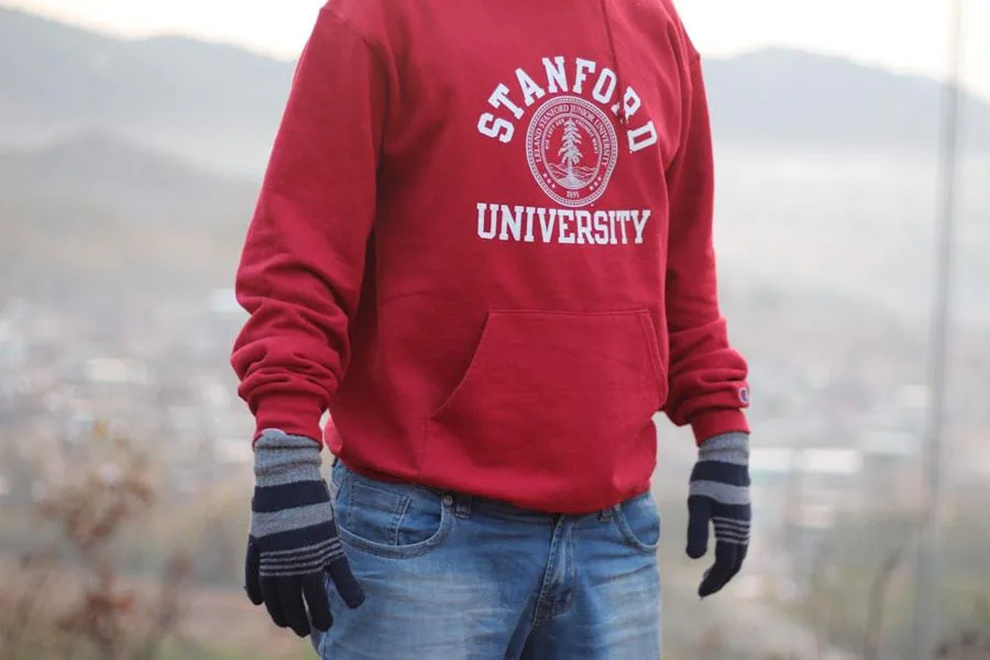 hoodie with university logo as a preppy trend