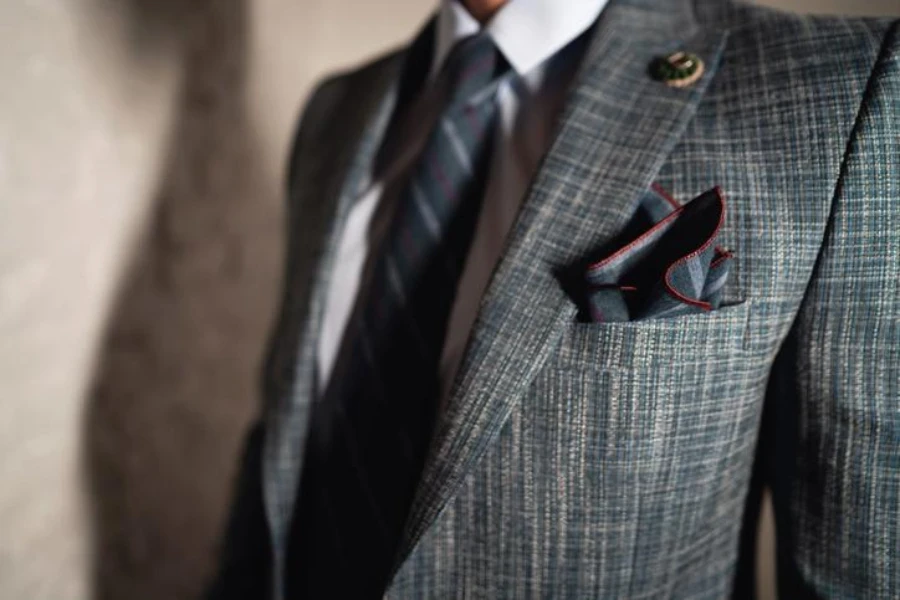 Unrecognizable elegant young Caucasian man in suit