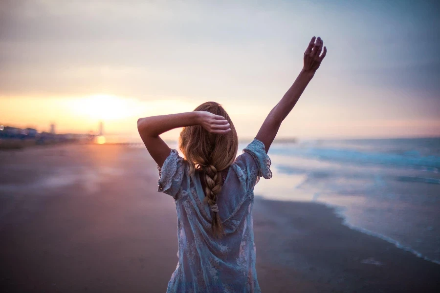 A girl on the beach with boho braids