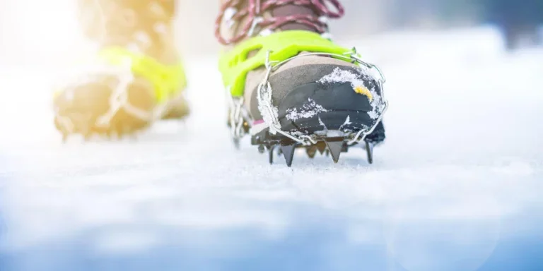 Hiking boots with equipment for ice