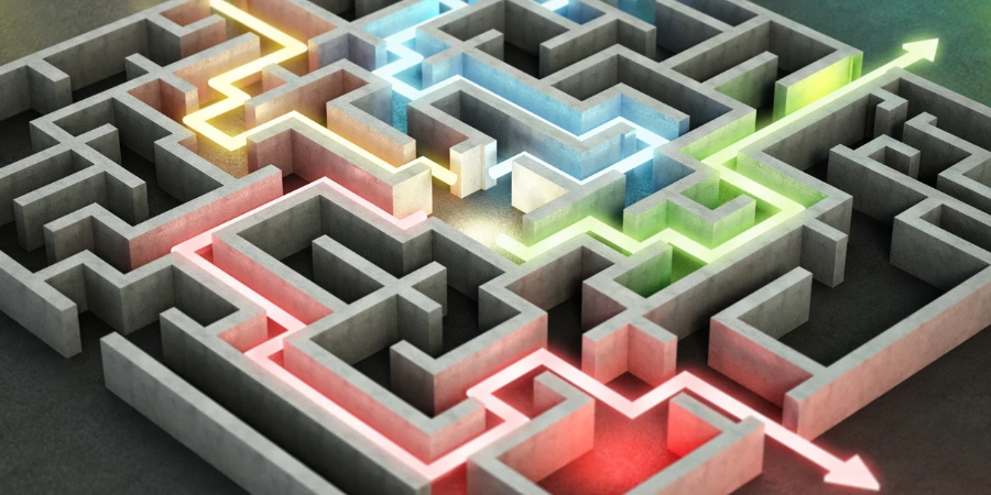 Quatre lignes et flèches lumineuses de couleurs différentes montrant différentes manières de sortir du labyrinthe complexe.