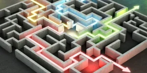 Four different colored glowing lines and arrows showing different ways out of the complex maze.