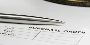 Purchase order with silver stylish pen