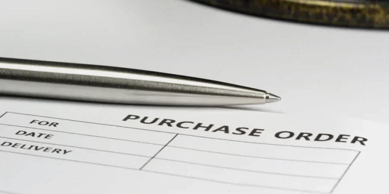 Purchase order with silver stylish pen
